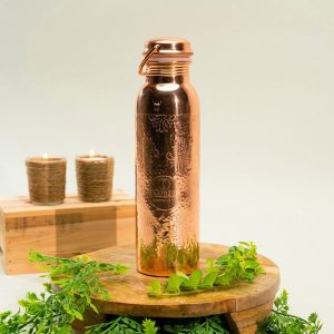 Bouteille d’eau en cuivre pur motif floral avec anse ± 1 Litre